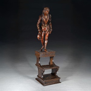 A Fine and Imposing Pair of Large-Scale Carved Walnut Venetian Figures in Elaborate Costume by Valentino Besarel (1829-1902)